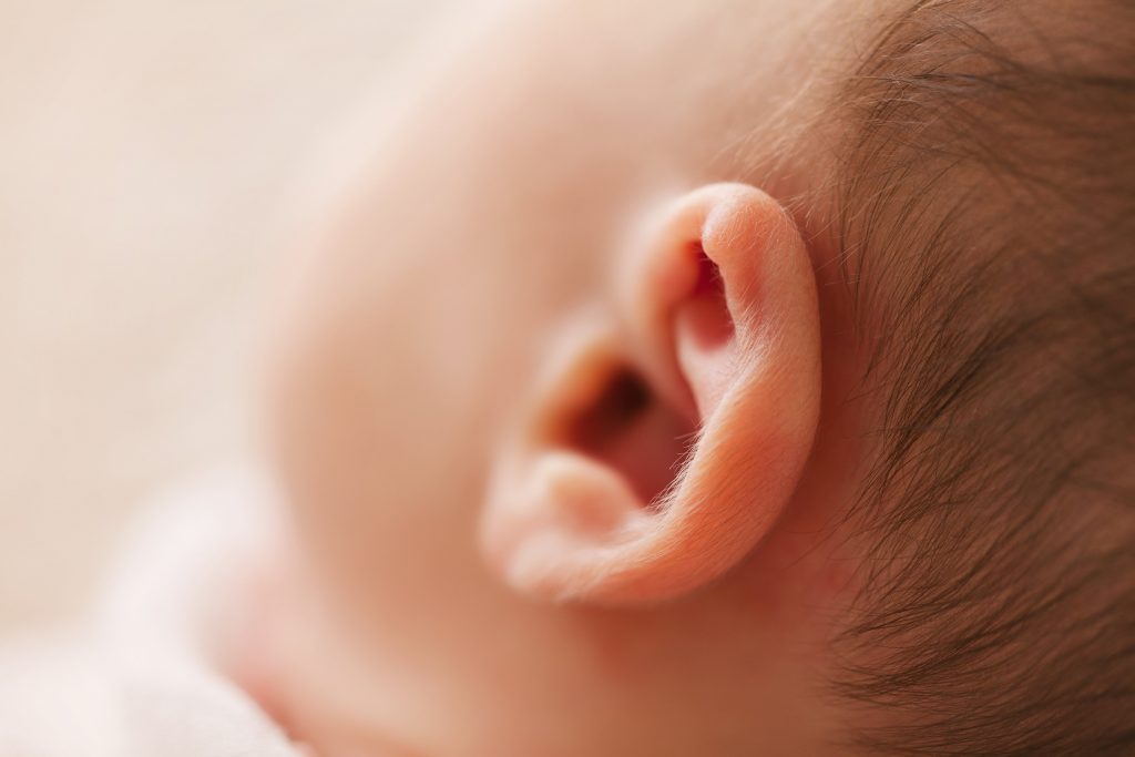 Stock image from Pexels of a baby's ear.