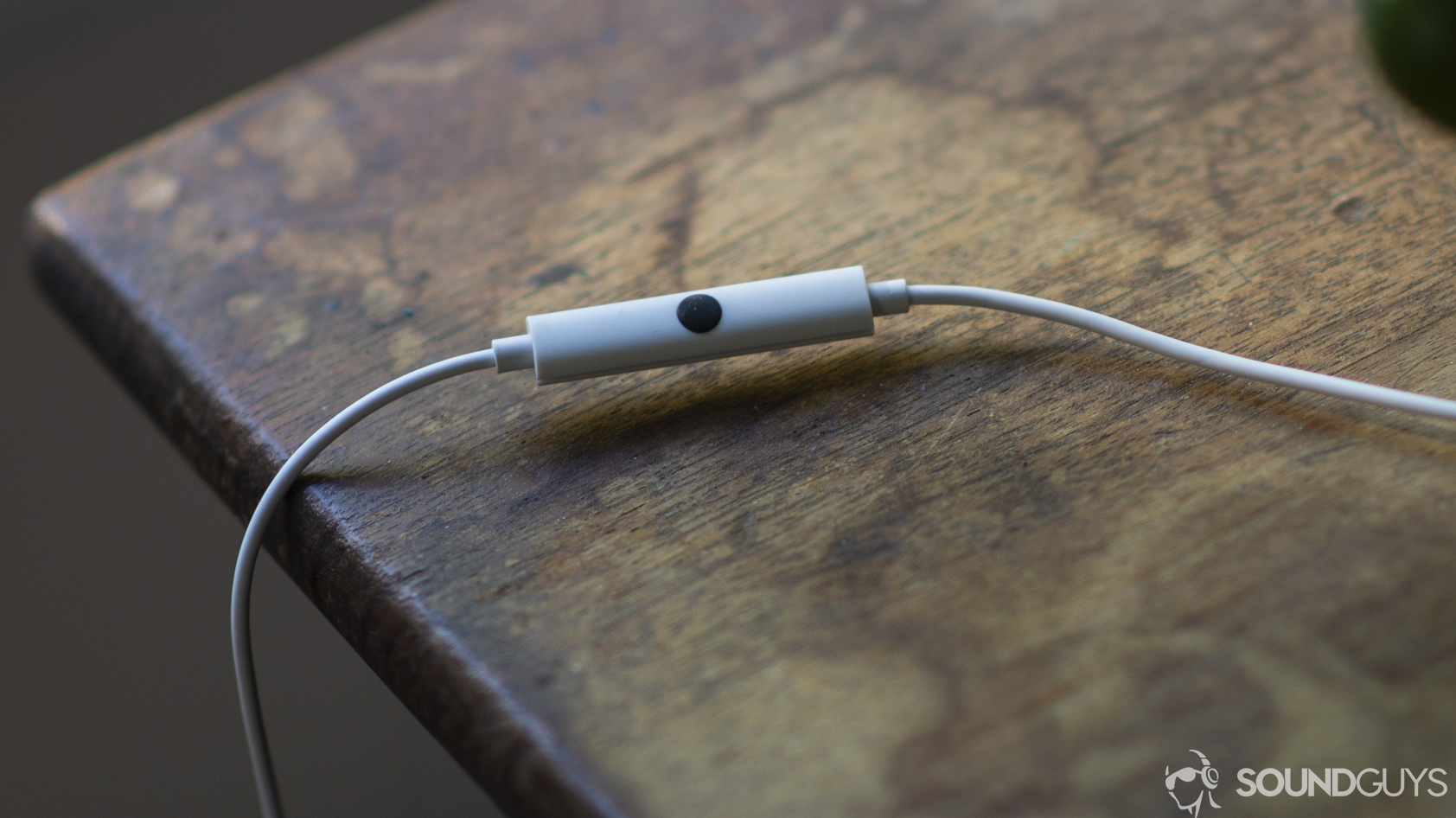 A photo of the remote on the Google Pixel USB-C Earbuds.