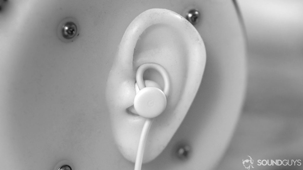 best noise cancelling headphones: A photo of the Google Pixel USB-C Earbuds in a dummy ear.