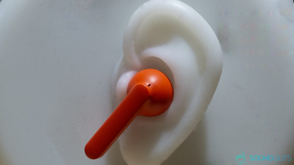 A photo of the Mobvoi TicPods Free in a silicone ear.