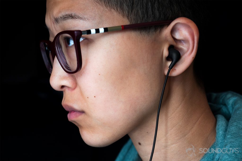 Audio gift - AiAiAi Pipe 2.0: A woman wearing the earbuds, profile view.