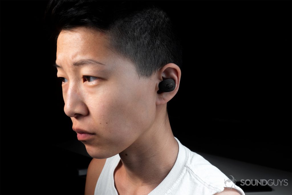 best running headphones - Jam Live True: A woman wearing the earbuds.