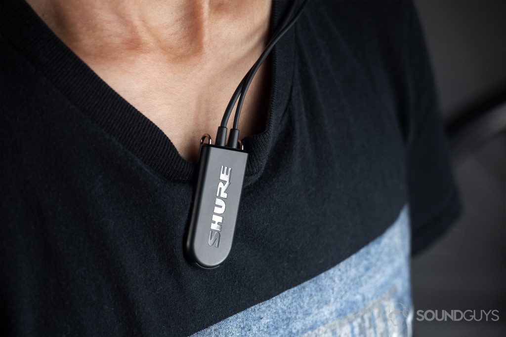 Shure BT2: The pendant part of the cable attached to a shirt collar.
