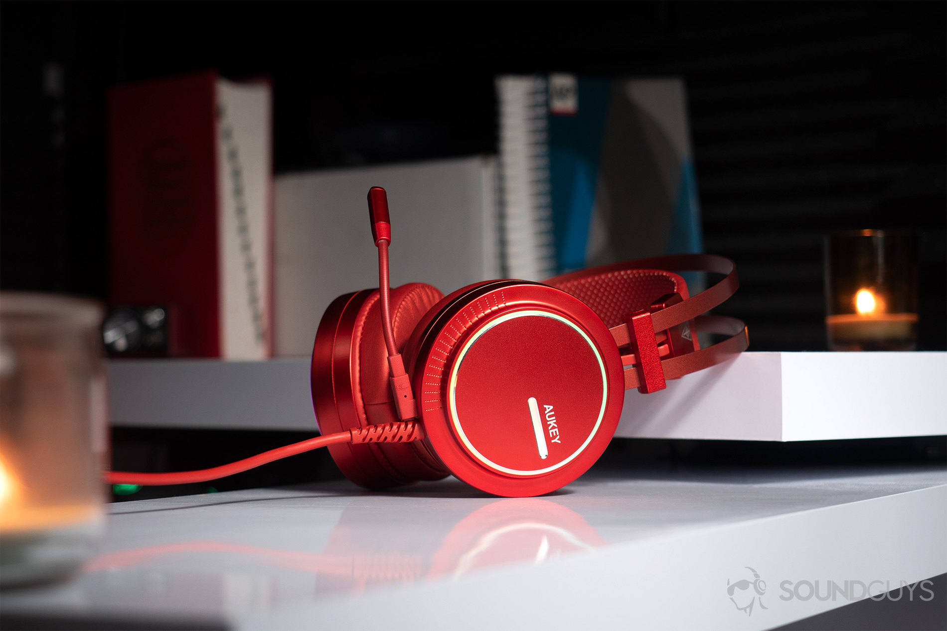Aukey 7.1 Gaming Headset: the headphones resting on a white desk.