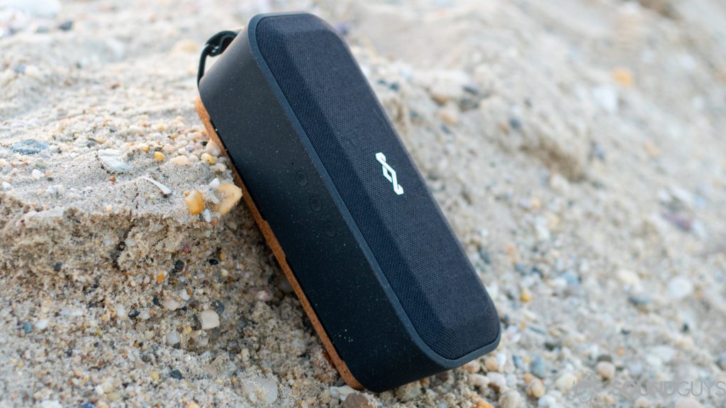 Pictured is the House of Marley No Bounds XL speaker on the sand.