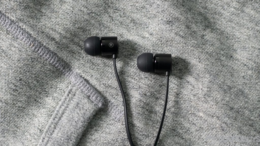 Pictured are the OnePlus earbuds and the cable.