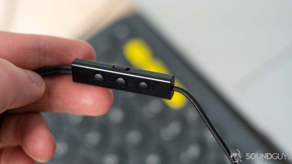 Close-up of the control module of the Razer earbuds.