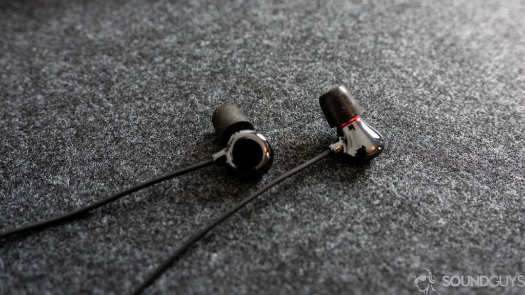 Pictured are the Elise earbuds from ADV.Sound on a desk.