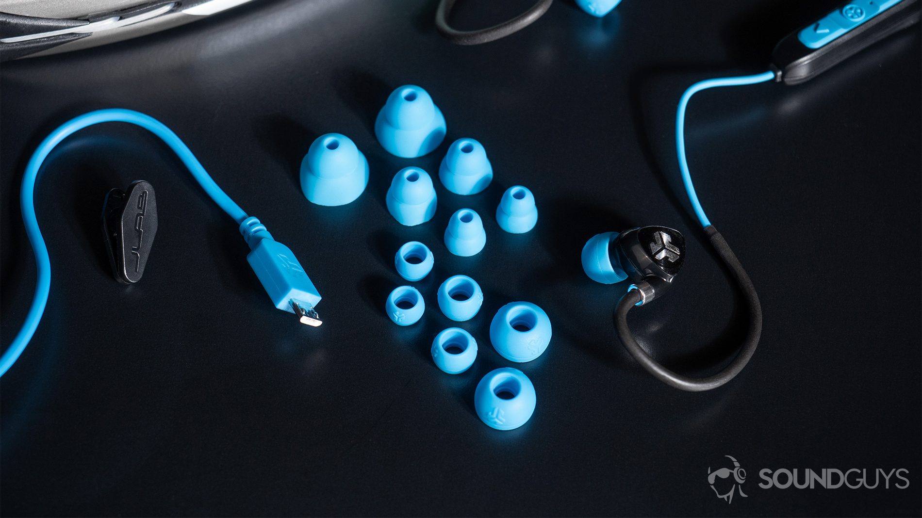 JLab Fit Sport Wireless: The earbuds and all of its inclusions: six pairs of spare ear tips, a shirt clip, and micro-USB cable.