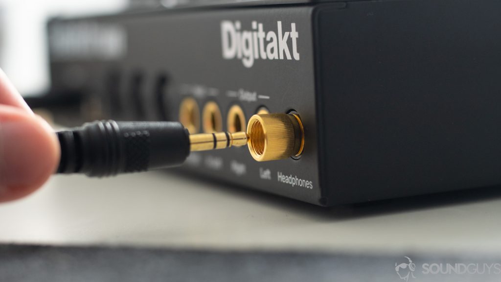 Close-up of the 3.5mm connector plugging into an adapter.