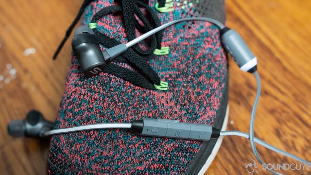 The Soul Run Free Pro Bio earbuds on a Nike running shoe. 