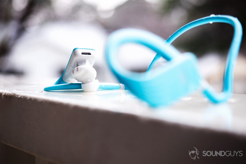 JBL Endurance Dive: An image showing the microUSB input located on the left earbud.