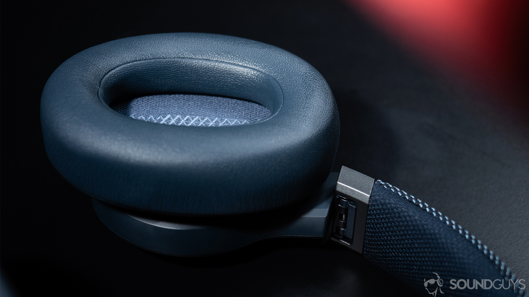 A picture of the JBL Live 650BTNC noise canceling headphones' plush earpads.