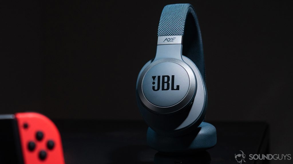 JBL Live 650BTNC: The headphones spotlighted with a Nintendo Switch controller in the foreground.