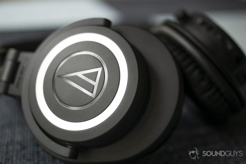 A photo of the Audio-Technica ATH-M50xBT on a table.