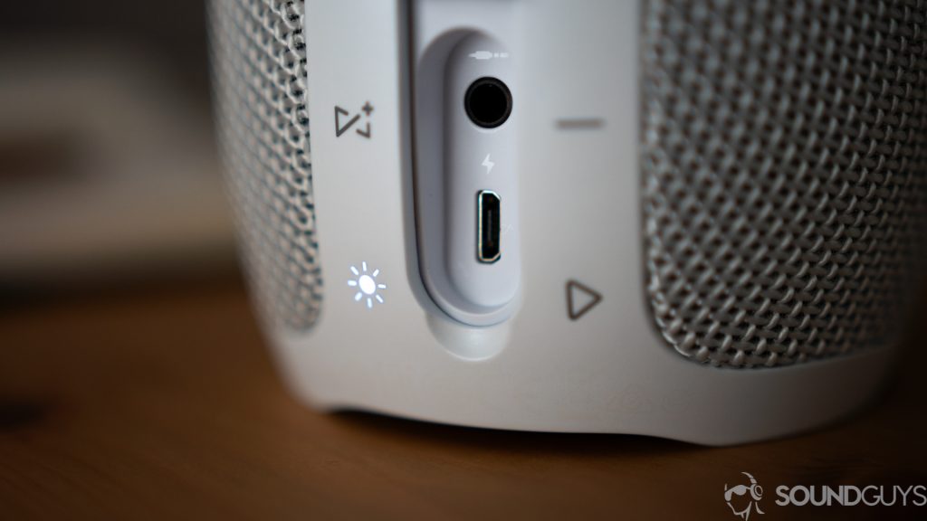 Close-up of the micro-USB port and the 3.5mm input under the waterproof flap on the back. 