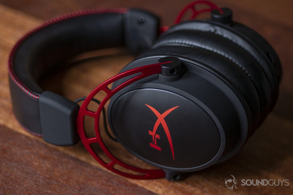A photo of the HyperX Cloud Alpha on mahogany.