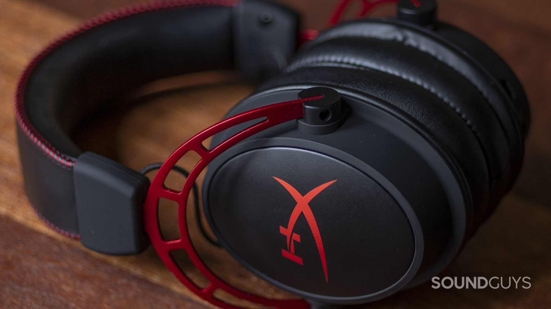 The HyperX Cloud Alpha on mahogany.