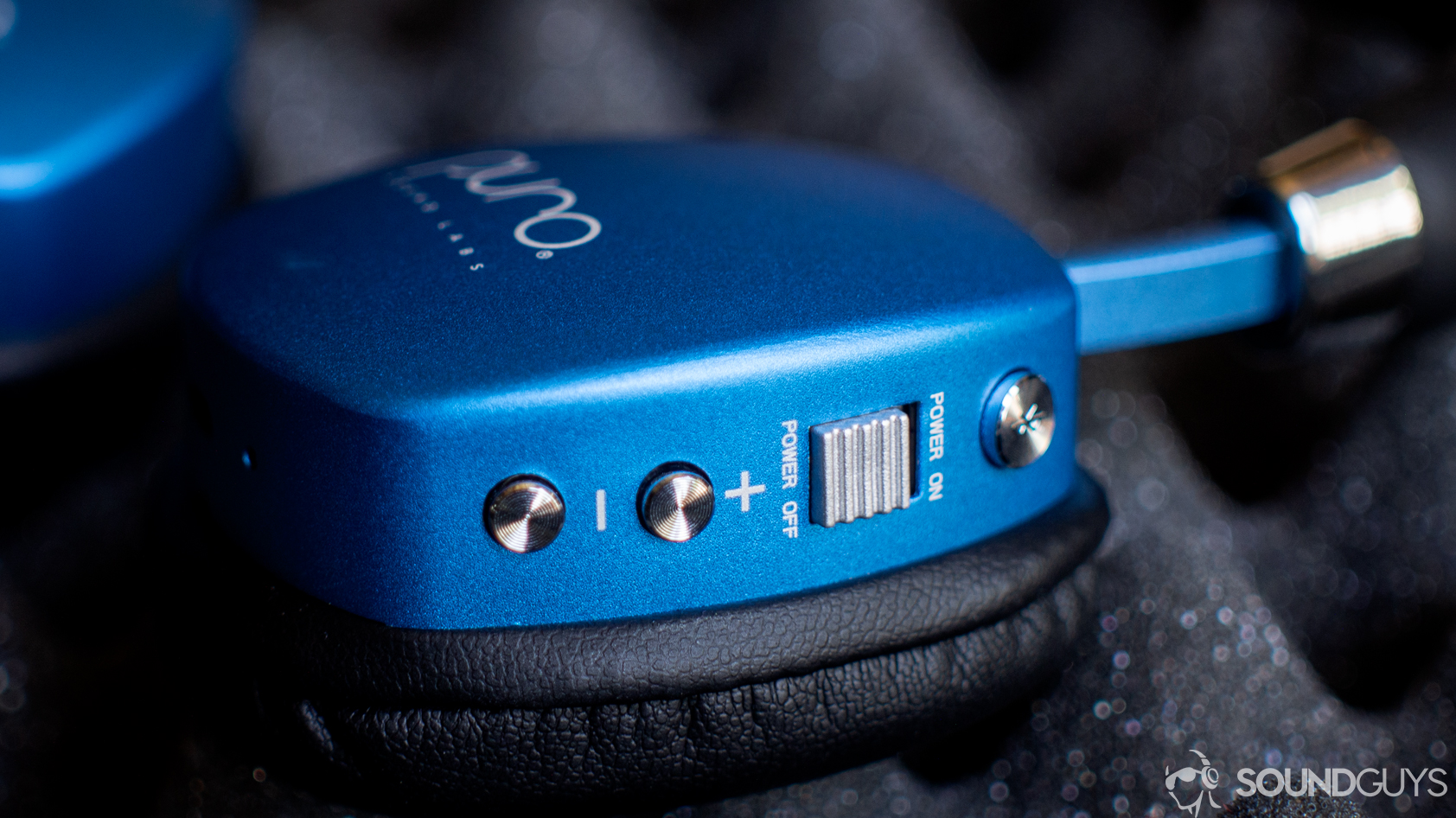 puro-sound-labs-puroquiet-button A photo of the buttons on the Puro Sound Labs PuroQuiet.