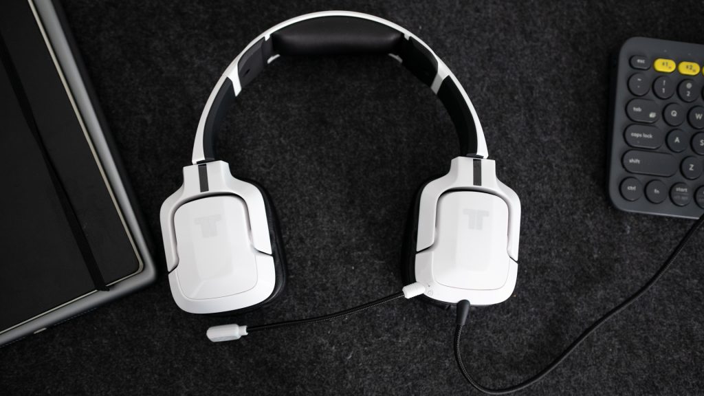 Pictured is the Tritton Kunai Pro from the top while it's next to a keyboard. 