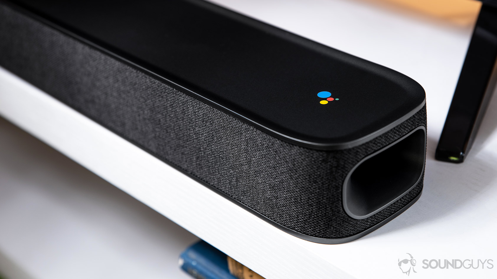 An image of the JBL Link Bar, one of the best sound bars, branded with the Google Assistant logo.
