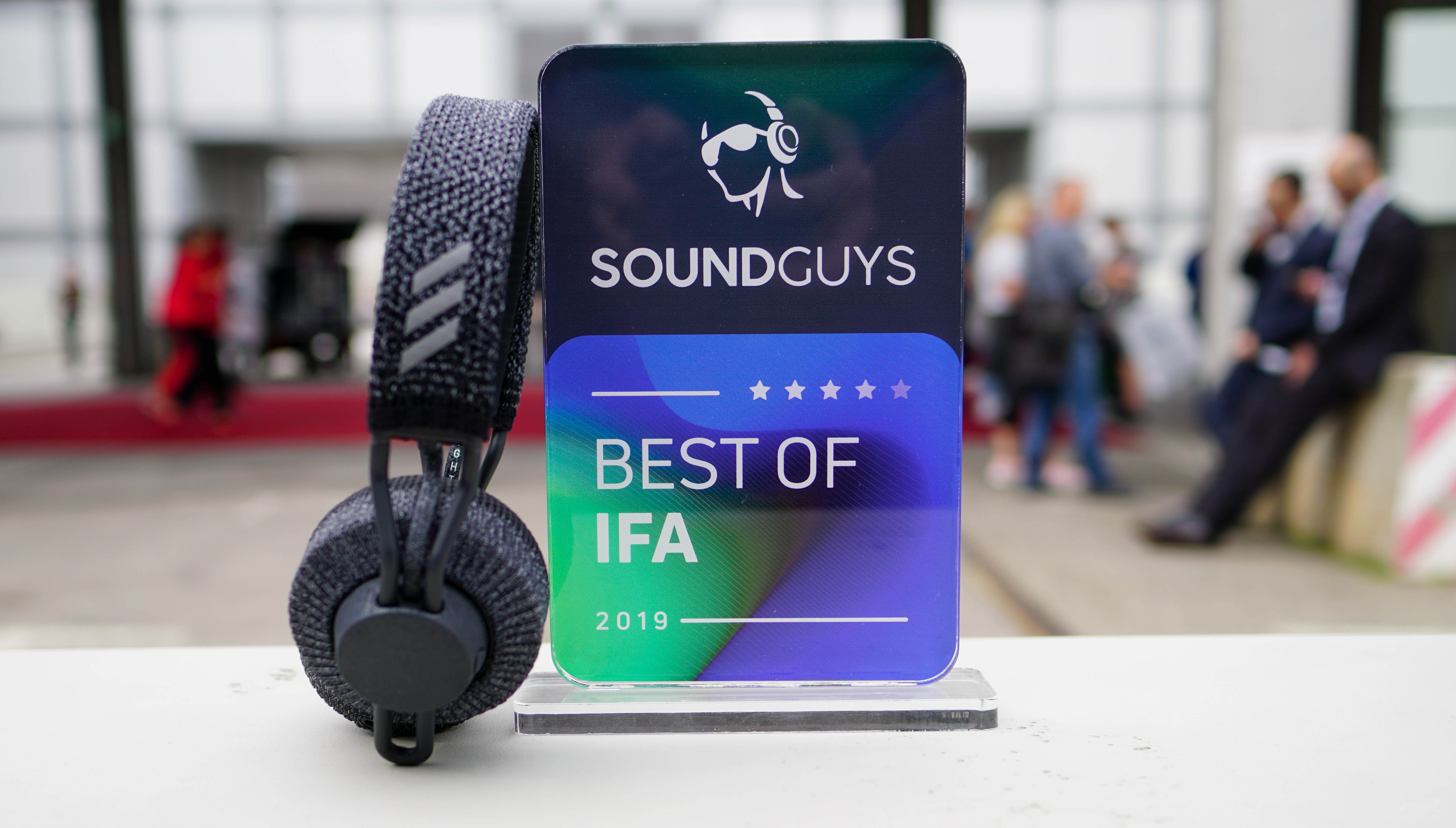 A photo of the Adidas RPT-01 standing next to the SoundGuys Best of IFA 2019 award.