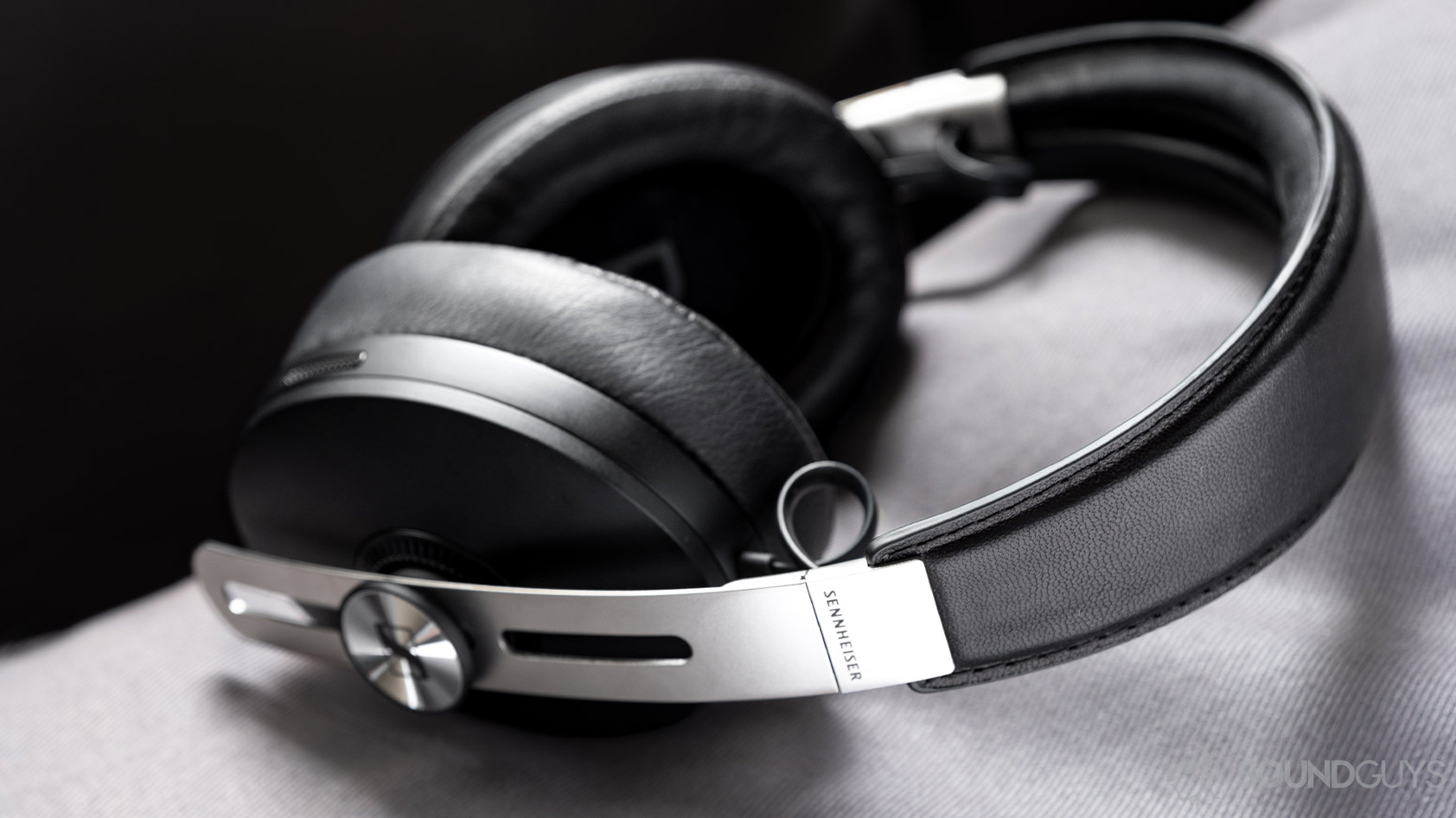 The Sennheiser Momentum Wireless 3 in black, focused on the headband stitching.