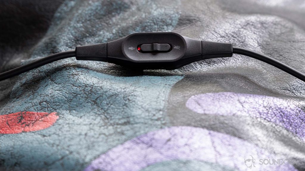 The integrated microphone mute toggle and volume dial module on the Audio-Technica ATH-G1 cable.