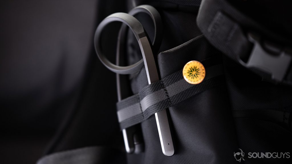A photo of the LG Tone Flex XL7 wireless neckband rolled up in a backpack pocket.