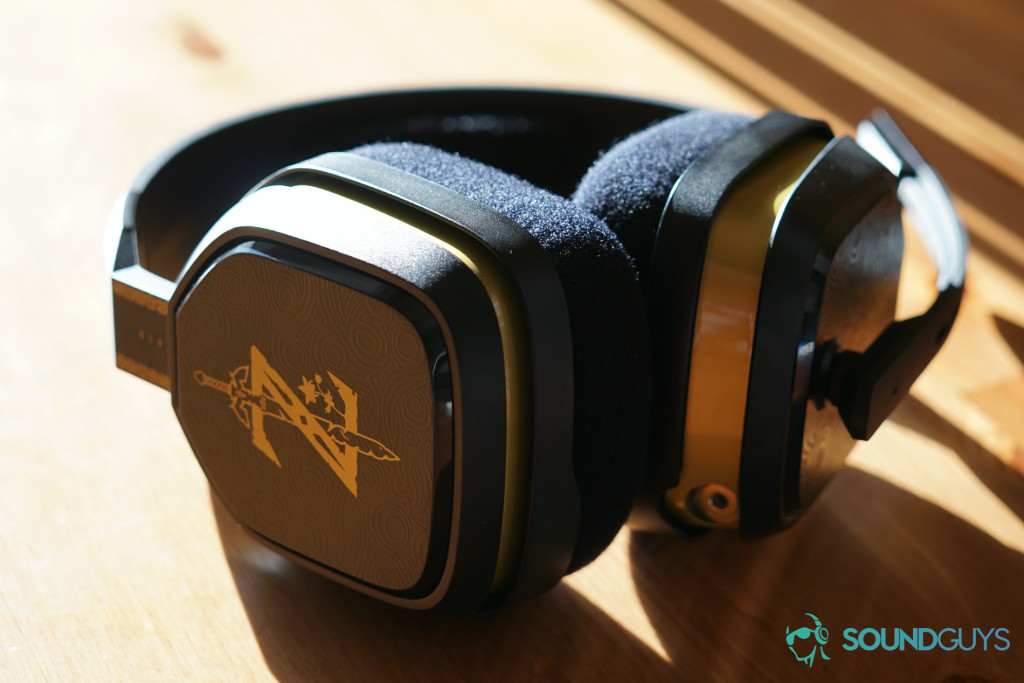 The Legend of Zelda Breath of The Wild Astro A10 gaming headset sitting in the sunlight on a wooden table.