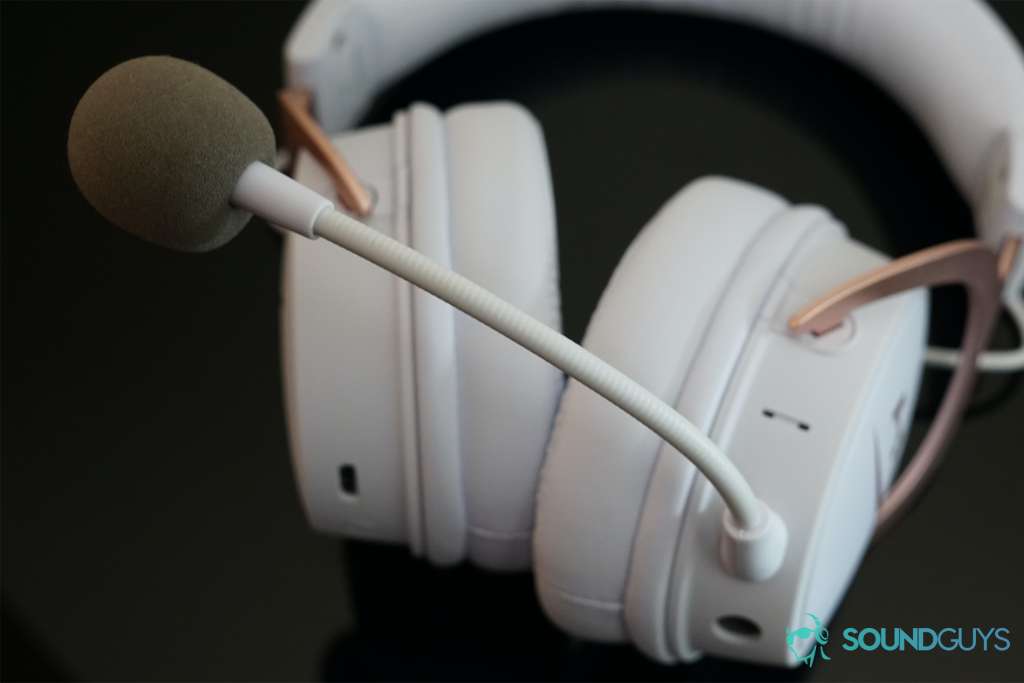 The HyperX Cloud Mix lies on its back, displaying its detachable mic.