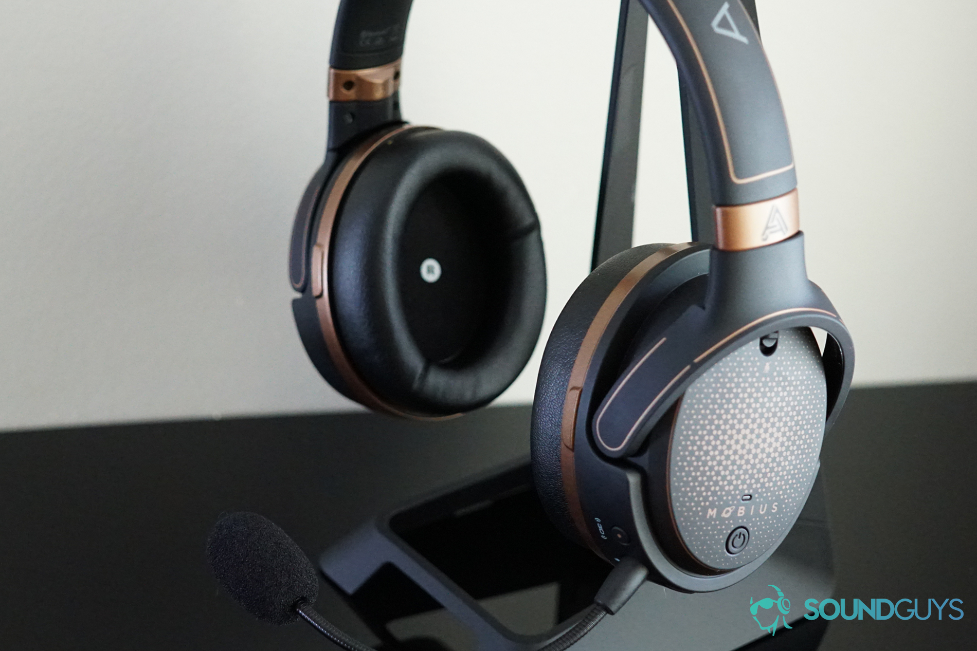 A photo of the Audeze Mobius resting on a stand.