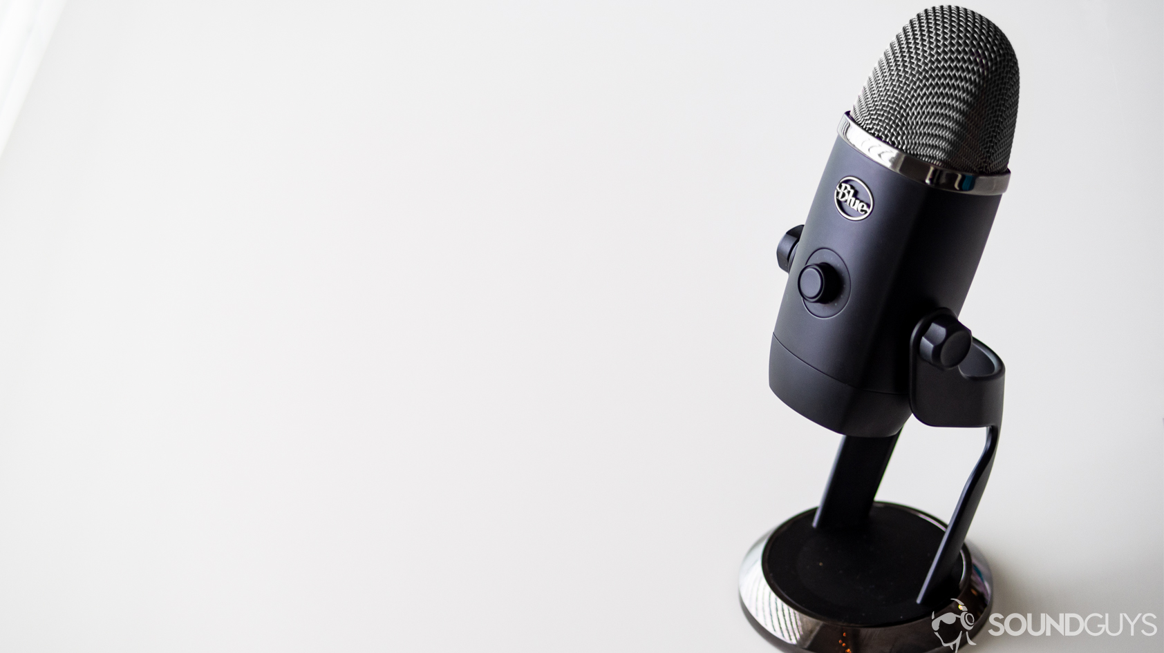 The Blue Microphones Yeti X standing on a table.