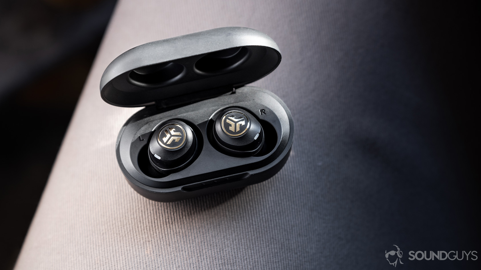 An aerial picture of the JLab JBuds Air Icon true wireless earbuds in the charging case.