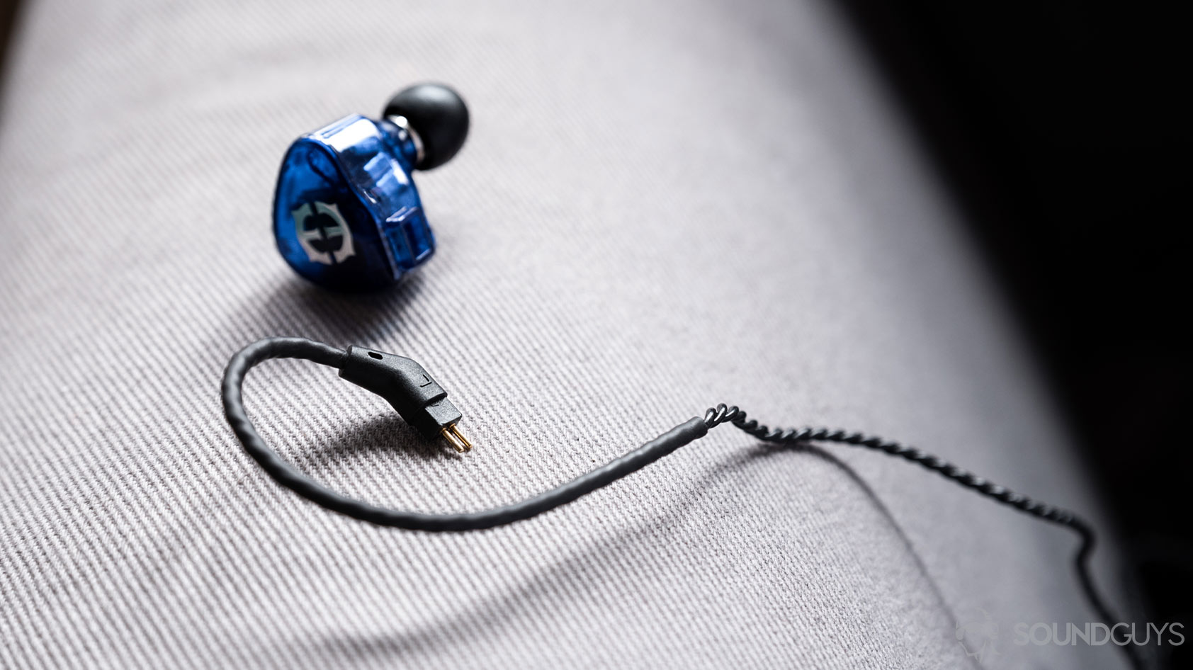 Massdrop x Empire Ears Zeus-premium IEMs removable cable A close-up photo of the Massdrop x Empire Ears Zeus earbuds removable 2-pin cable.