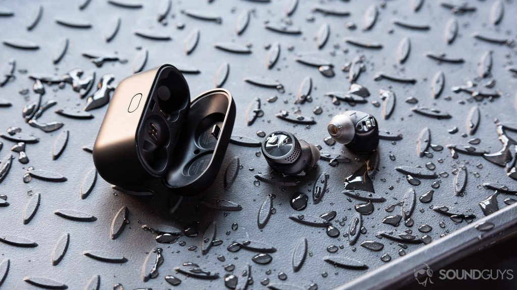 A picture of the Plantronics BackBeat Pro 5100 true wireless earbuds outside of the case and surrounded by water splashes.