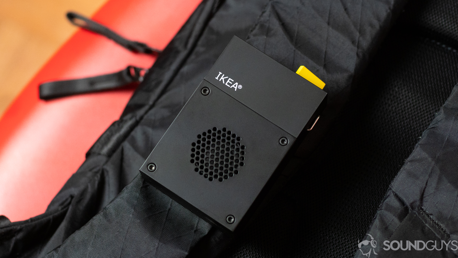 IKEA x Teenage Engineering Frekvens Portable speaker on backpack Pictured is the Frekvens Portable speaker clipped to the strap of a backpack.