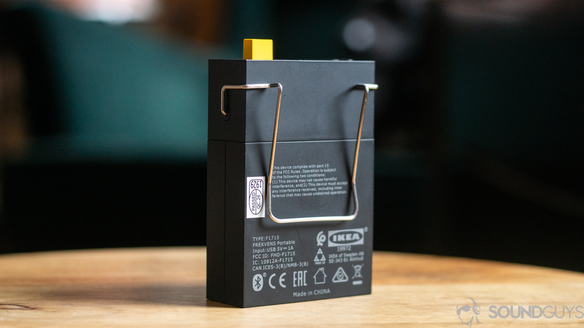 IKEA x Teenage Engineering Frekvens Portable speaker belt clip Pictured is the back of the Frekvens Portable speaker on a table showing the belt clip.
