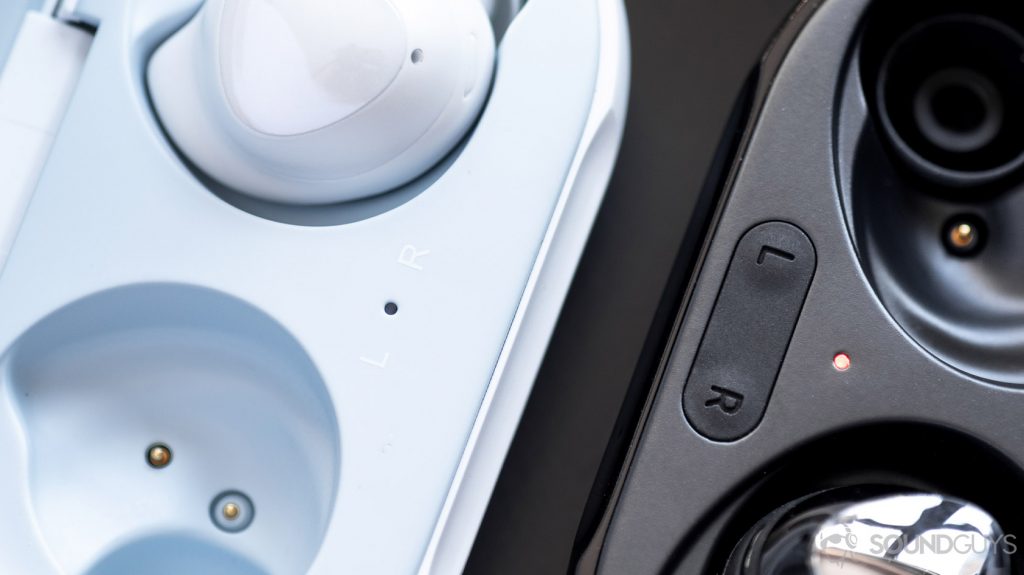 A macro picture of the Samsung Galaxy Buds Plus and Galaxy Buds charging cases and L/R indicators for the Samsung Galaxy Buds Plus vs Samsung Galaxy Buds Live comparison.