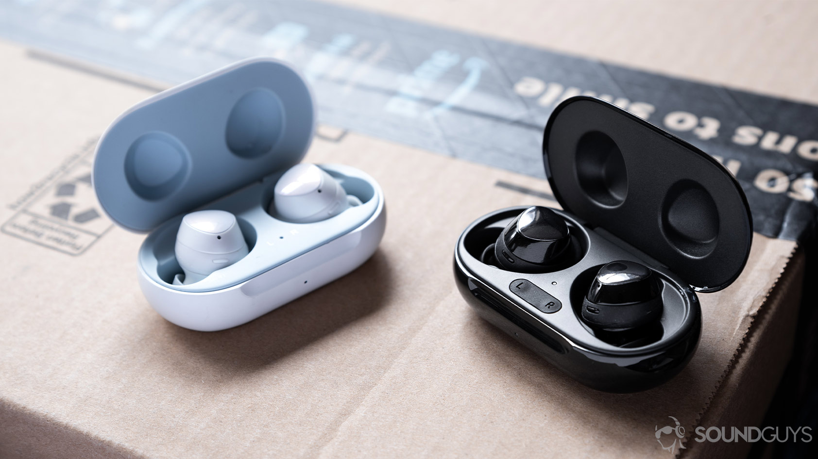 The Samsung Galaxy Buds Plus and Galaxy Buds' true wireless charging cases open with the earbuds inside.