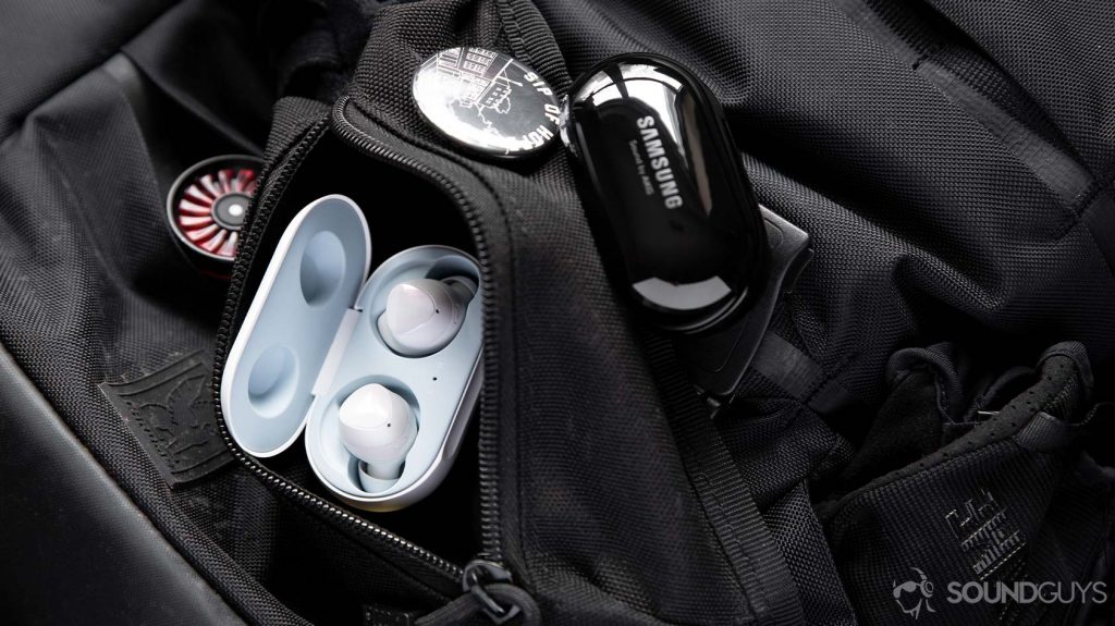 A picture of the Samsung Galaxy Buds Plus and Galaxy Buds on a black backpack.