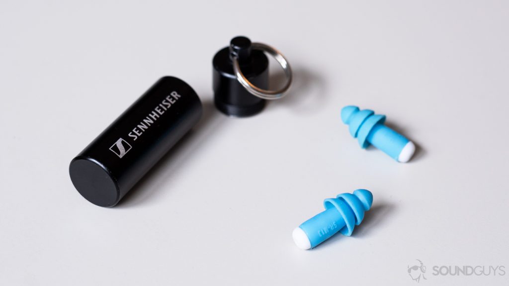 A picture of Sennheiser earplugs on a table.