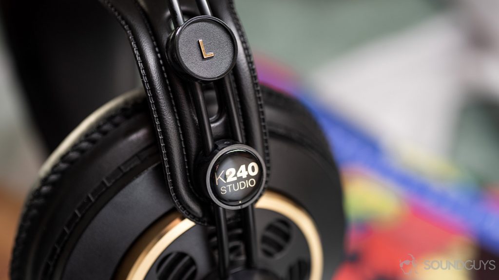 A photo of the AKG K240 Studio semi-open headphones with the slider mechanism in focus.