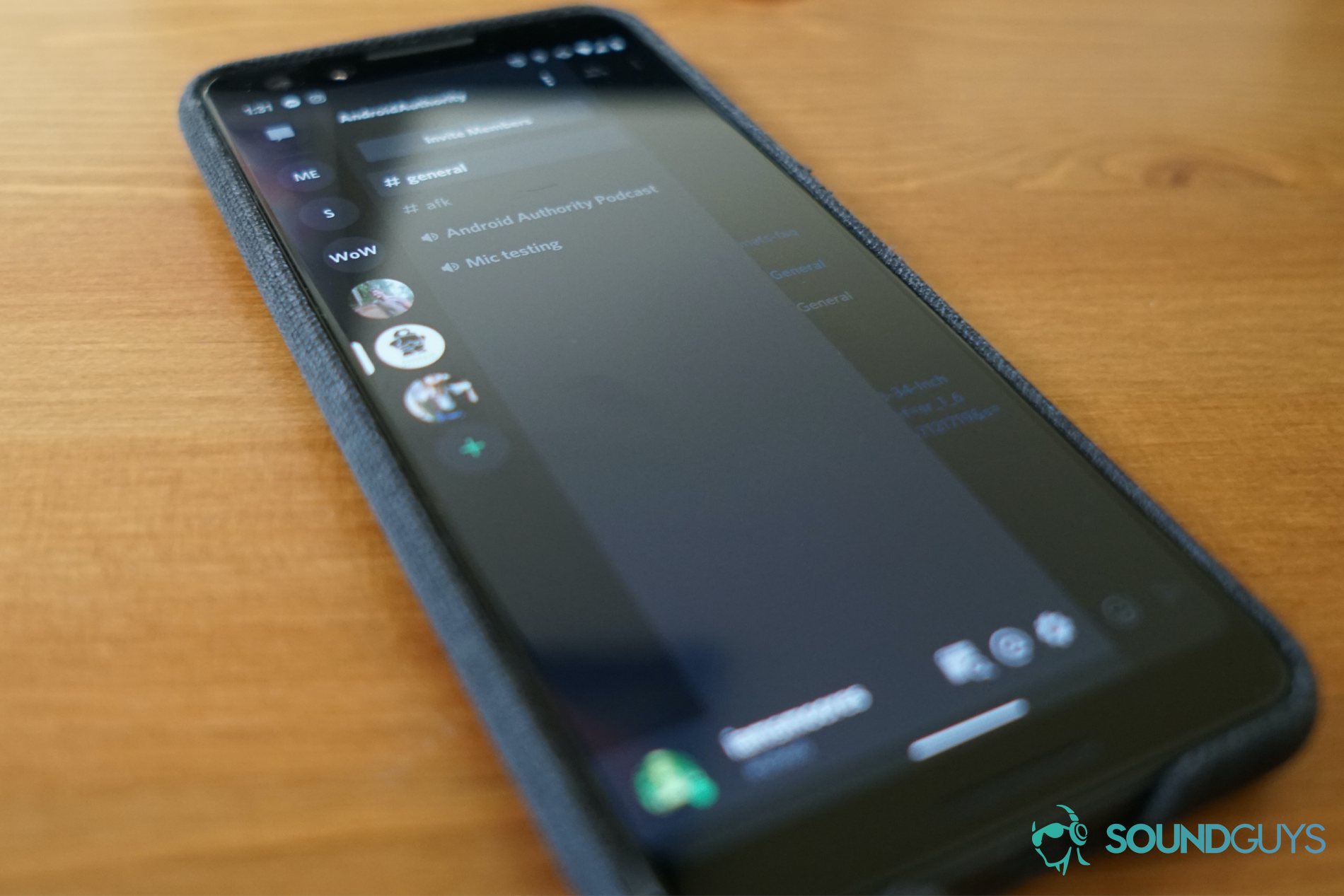 Discord phone shot The Discord app running on a Google Pixel 3 on a wooden table.