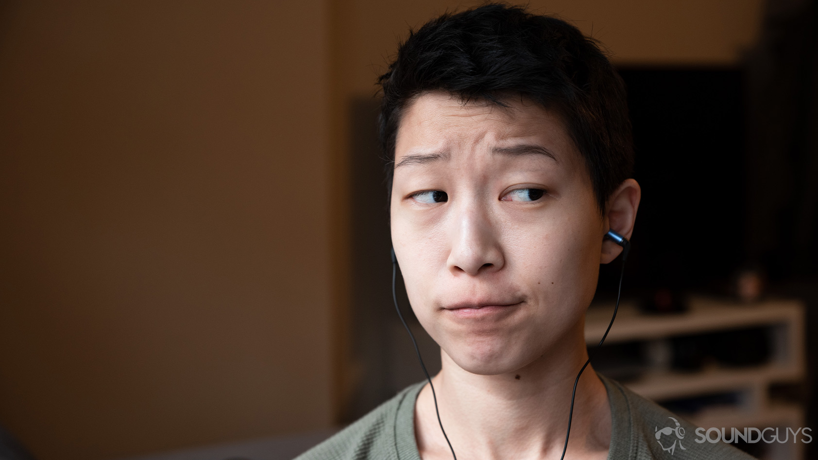 A picture of the Etymotic ER2SE wired earbuds being worn by a woman.