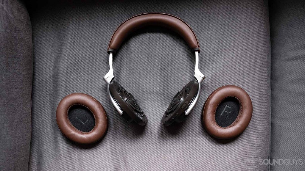 An aerial picture of the Shure Aonic 50 noise cancelling headphones with the ear pads removed and to the side.