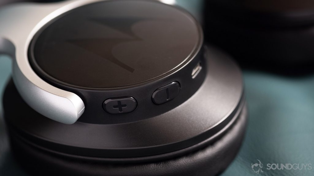 A photo of the Motorola Escape 500 ANC noise canceling headphones volume control buttons located on the right ear cup.