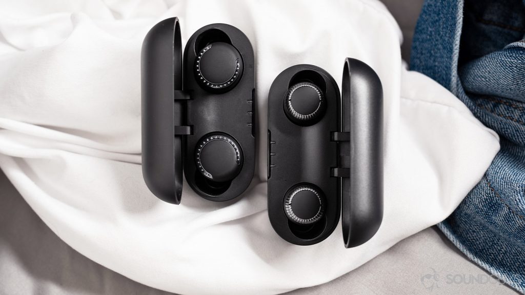 A comparison photo of the Panasonic RZ-S500W and Panasonic RZ-S300W true wireless earphones with the case's open (vertically placed) and earbuds inserted.