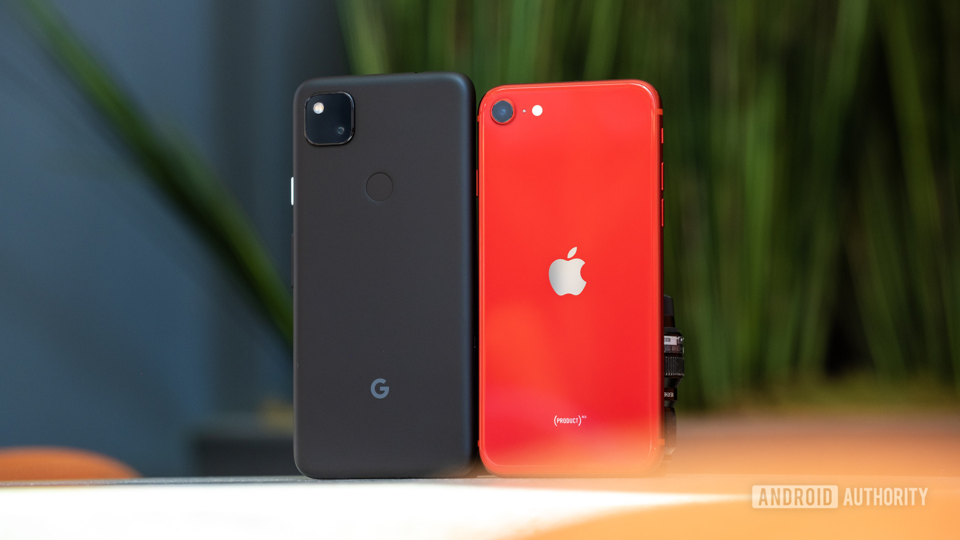 A photo of the Google Pixel 4a alongside the Apple iPhone SE