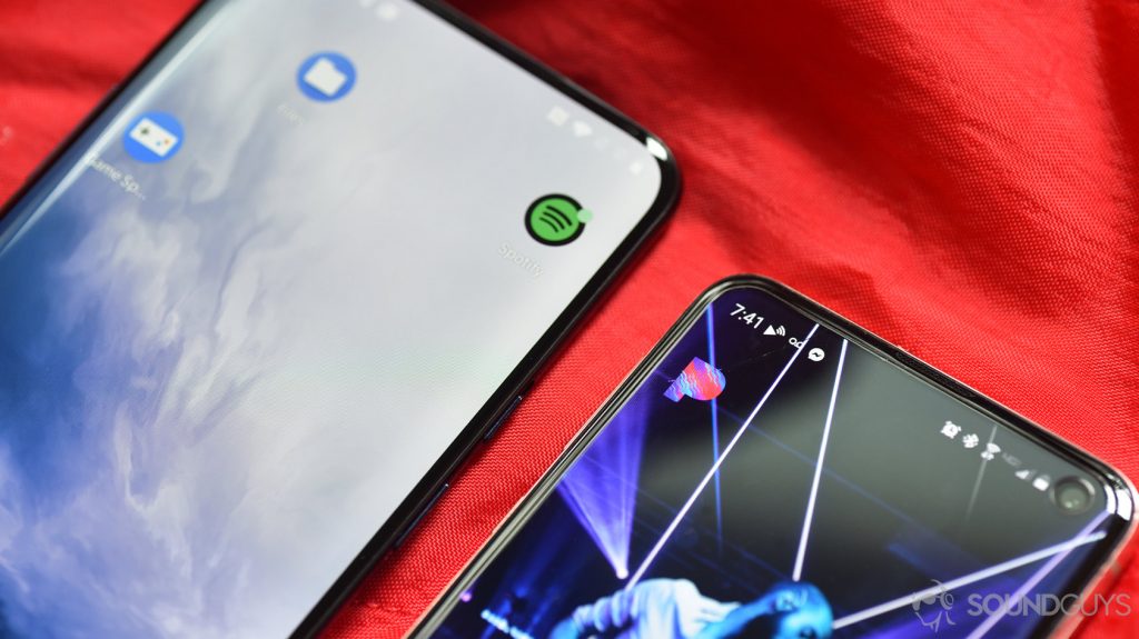 A picture of Pandora vs Spotify music streaming services applications next to one another.